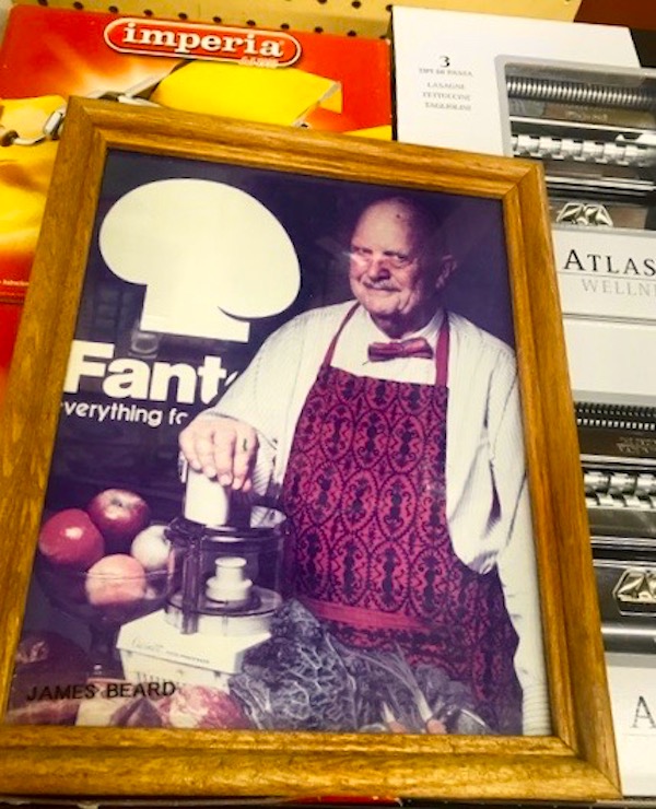 A framed photo of James Beard