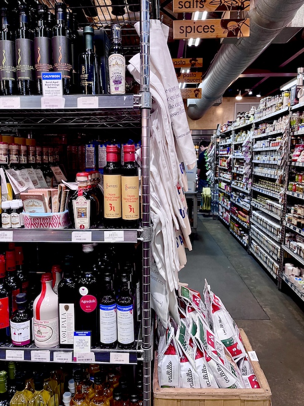 Market aisle of food and supplies for sale at the Original Farmers Market L.A.