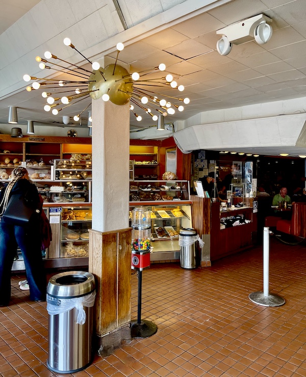 Sputnik like light fixture and bakery cases at Canter's Deli on Fairfax